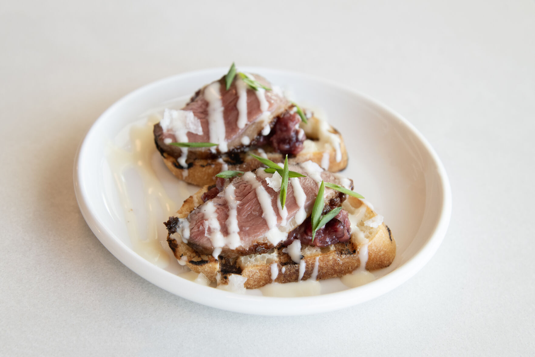 Duck Crostini with Cranberry Mostarda and Taleggio Fonduta