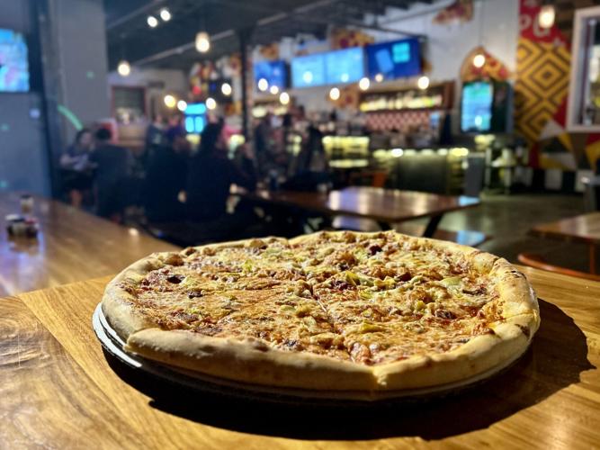 Pie Guy Pizza expands to Gezellig space and adds full bar