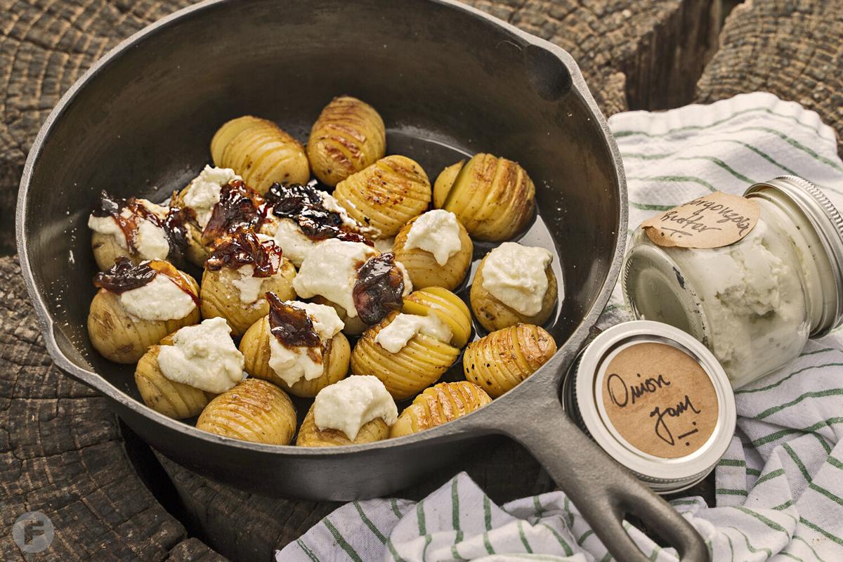 Campfire Hasselback Potatoes with Onion Jam and Gorgonzola Butter