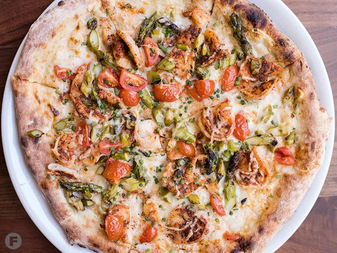 Peel Wood Fired Pizza Brings Pizza, Paella and More to Clayton