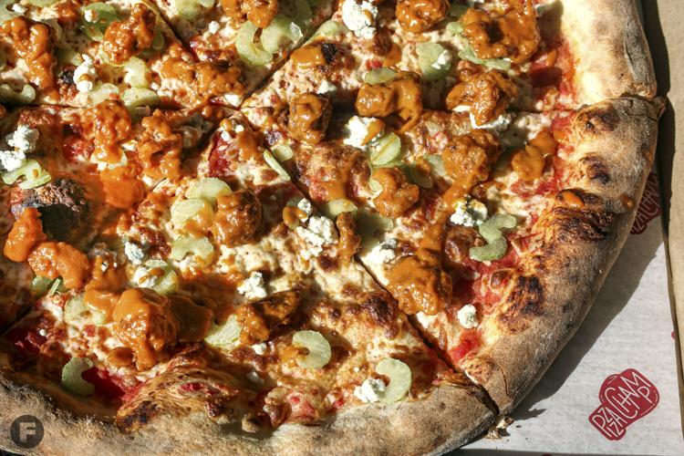 Pizza Champ opens Jan. 26, serving pizza, wings and salads togo in