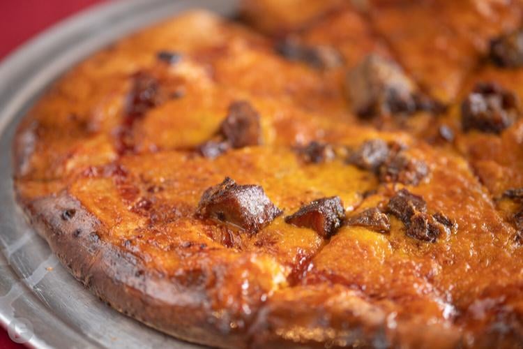 In Da Loop serves up wood-fired fare and plenty of entertainment from a ...