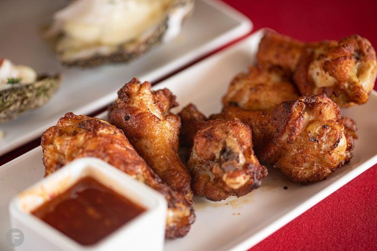In Da Loop serves up wood-fired fare and plenty of entertainment from a ...