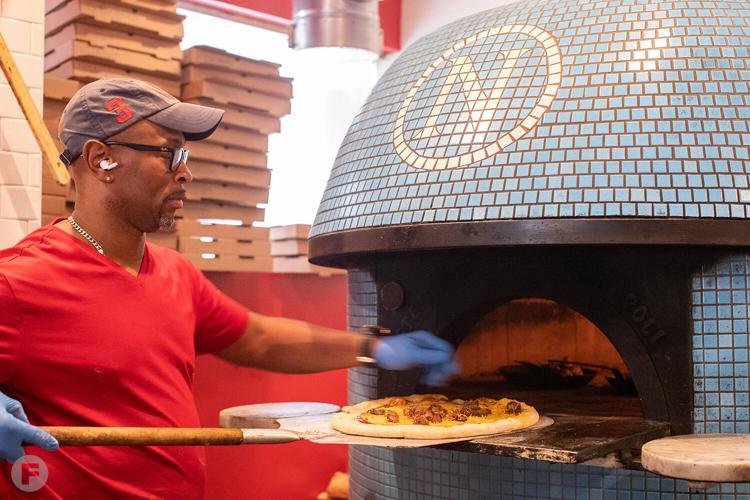 In Da Loop serves up wood-fired fare and plenty of entertainment from a ...