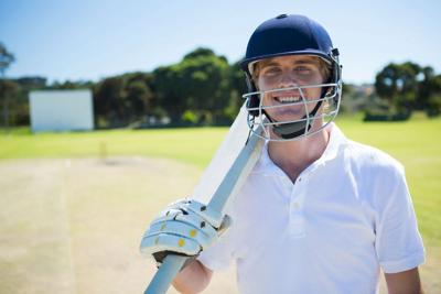 A Young man taking an EcoFriendly Approaches Cricket