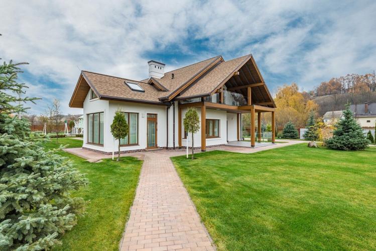 Suburban home with the perfect roof design for its owners dream home