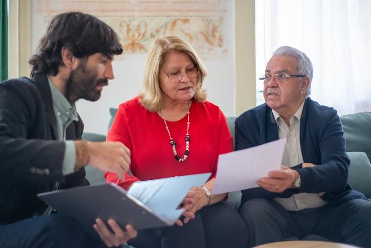 An insurance agent walks a couple through protecting their home