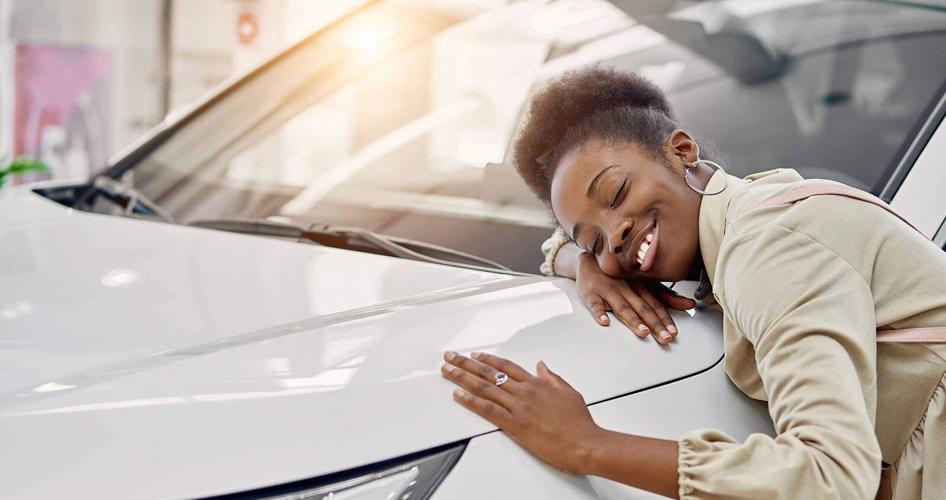 Woman celebrates her car loan