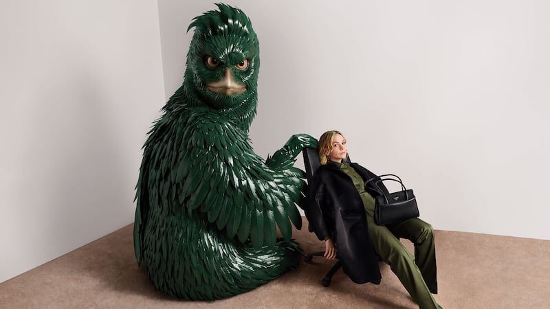 Model posing with dummy