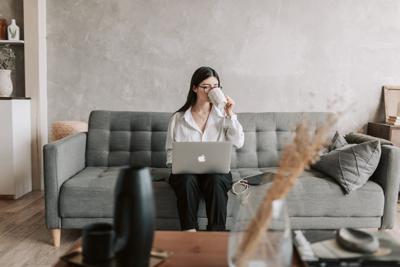 Woman uses various productivity software tools for a successful business