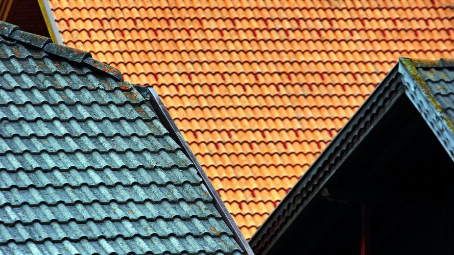 Shingled roofs with enhanced durability
