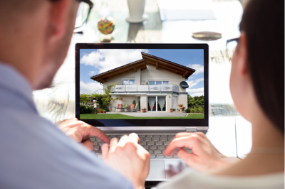 Couple peruse real estate in hopes of accomplishing dream of buying a house