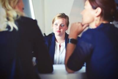 Couple consult with a lawyer about filing a personal injury claim