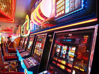 A row of slot machines that you should learn how to play smartly