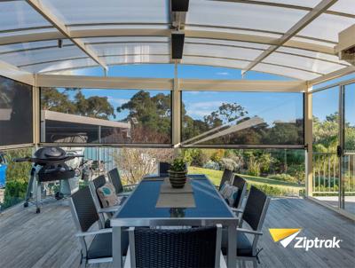 Outdoor Roller Blinds for Cafés and Restaurants: A Game-Changer for Comfort