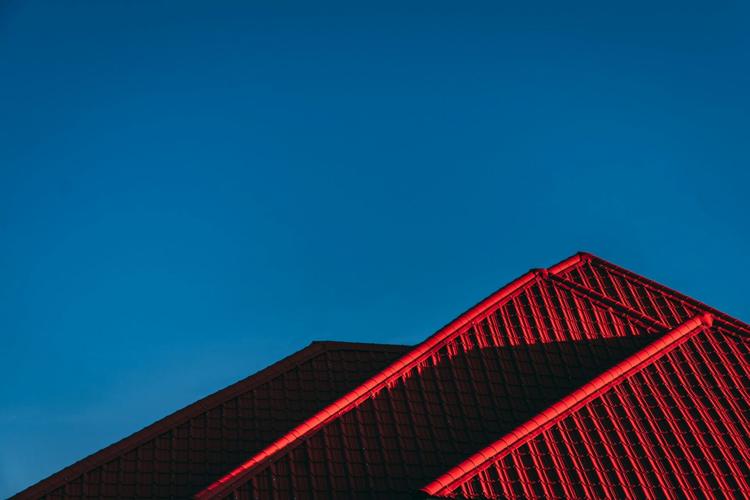 A red-roofed building that creates a strong and safe home