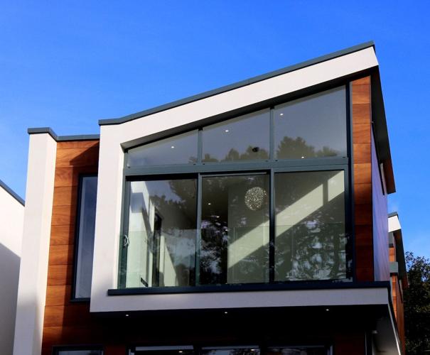 Modern style homes like this look best with flat rooflines