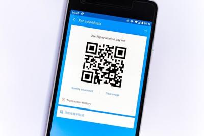 How are QR codes utilized in movie theaters today?
