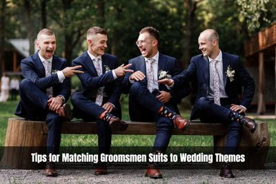 Four groomsmen sit in a row, matching in their suits