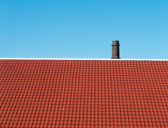 Red roofing tiles like these can be hard to keep in prime shape