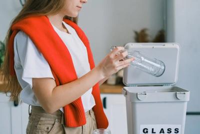 A women using her new waste management technology system