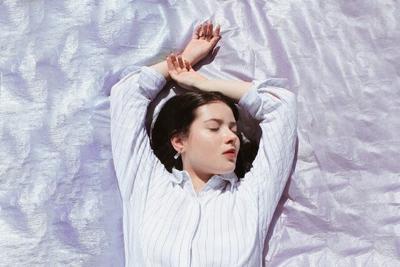 An adult woman reaping the Benefits Of Napping