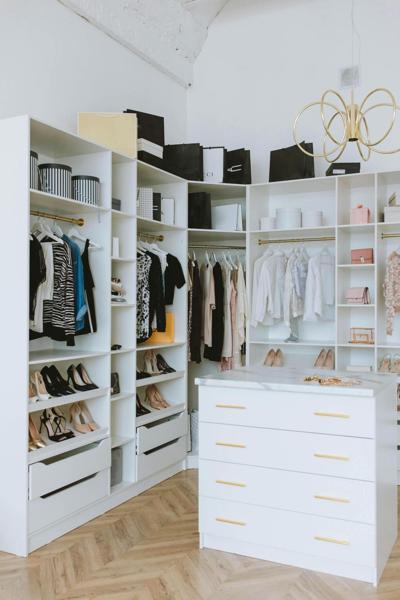 This closet is elegantly designed to provide amazing storage solutions