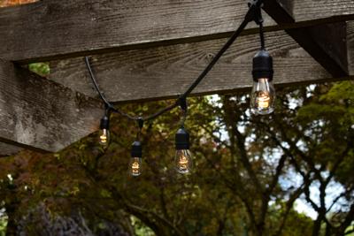 Outdoor string lights can improve the ambiance and value of your backyard