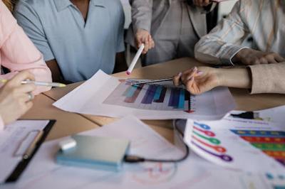 people going over  Ways to Amplify their Business Growth in 2023