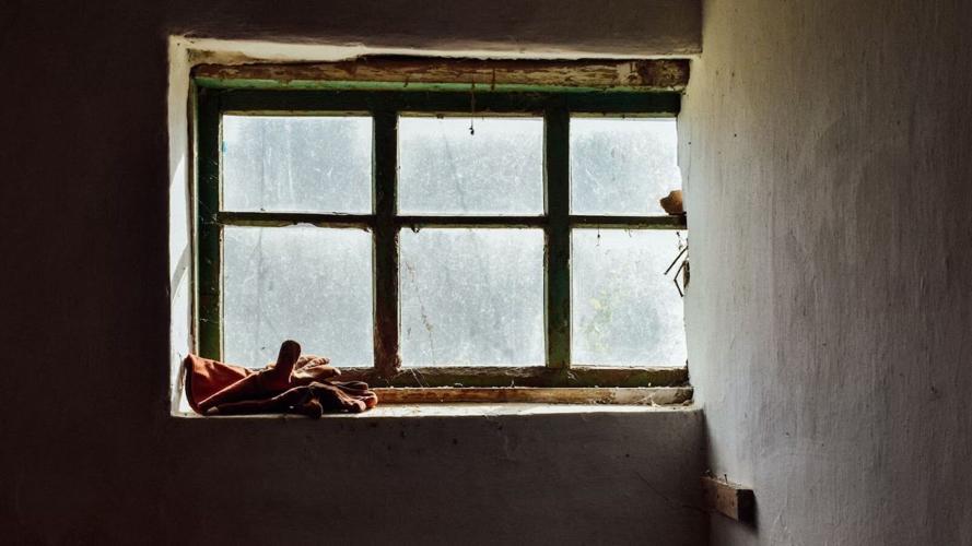 Old window in need of replacement, either from professional or DIY