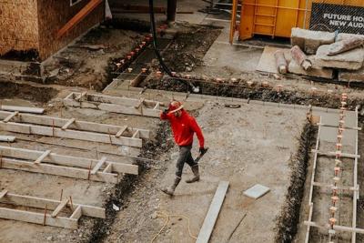 Newly licensed Tennessee contractor walks through job site
