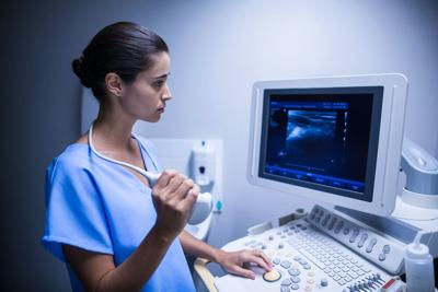 a female Nurse weighing out her Pros and Cons of Being a Traveing Nurse
