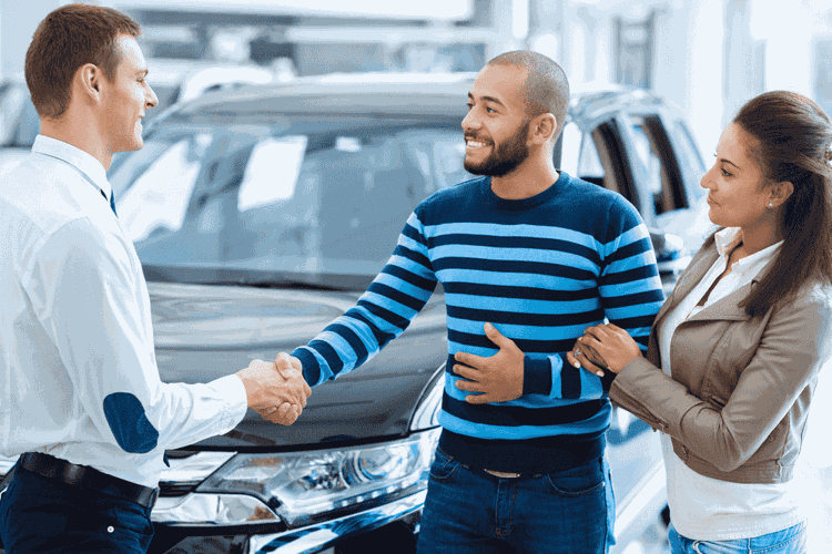 A couple experiences the benefits of car loans