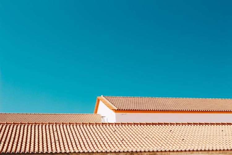 These tiled roofs need long-term roof care to be maintained