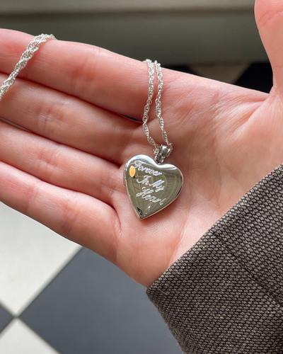 Gold heart-shaped locket is a great option for a gift for Christmas
