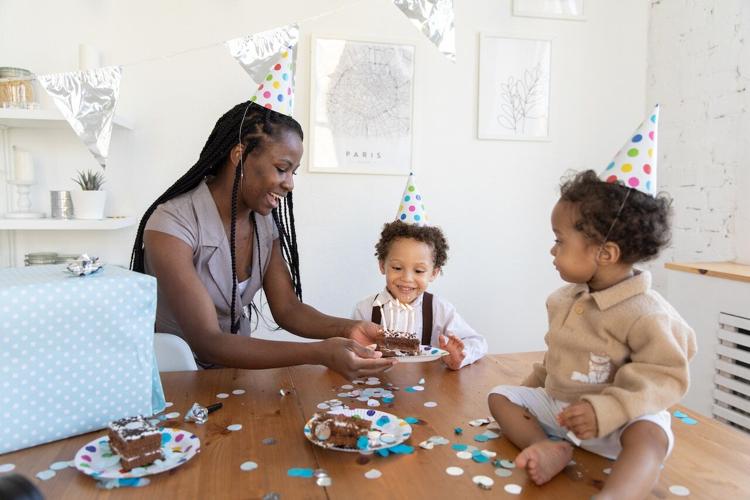 Mother and children strengthen bonds at a child's birthday party