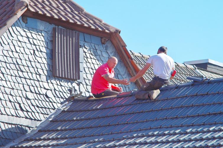 Men working on a well-designed roof