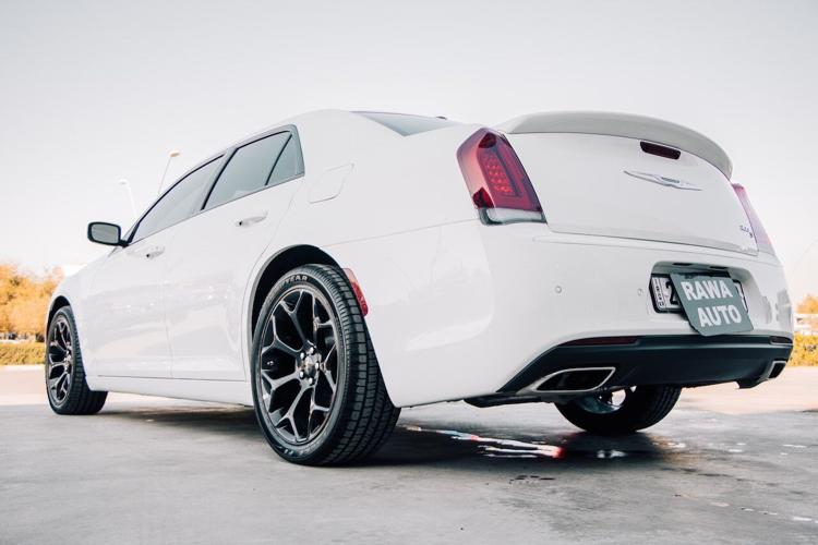 This white Chrysler is a fuel efficient car