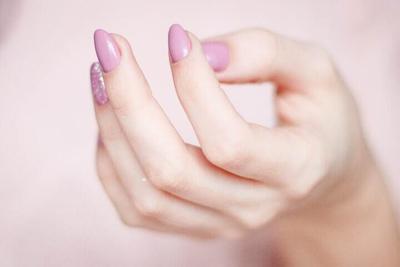 A hand with Vegan Nail Polish