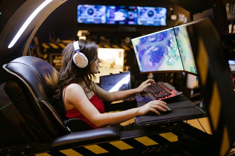 Woman plays on of the top 10 games for a PC