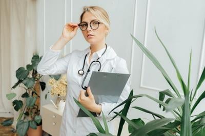 A woman studying trying to avoid Mistakes When Preparing for an NCLEX Exam