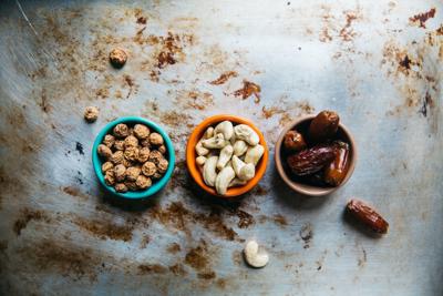 Small bowls of nuts like this can be part of an intermittent fasting diet