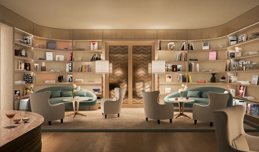 Library lounge at Four Seasons Private Residences Coconut Grove with curved built-in bookcases and seating