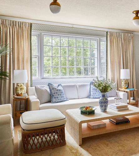 Curtains from Pepper Home frame this living space nicely