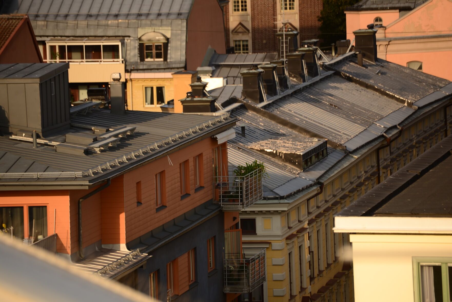 View of city rooftops that may be in need of renovation