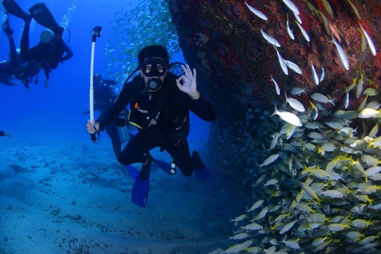 Unveiling the Abyss- Scuba Diving Across Generations