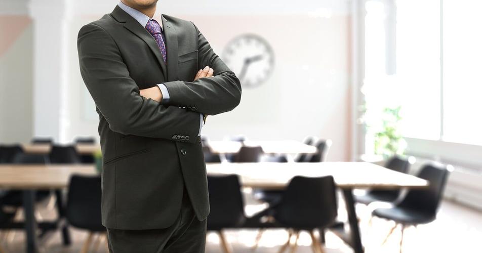 Man in suit wearing inclusive attire helps to reflect diversity in his trade show presence