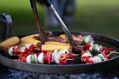 Veggies and skewers grilling on perfect grill