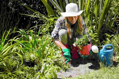 A blonde woman with Garden Projects she is Starting in The Summer