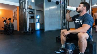Man drinks his Thrive shake mix